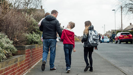 Dad Walking With Children