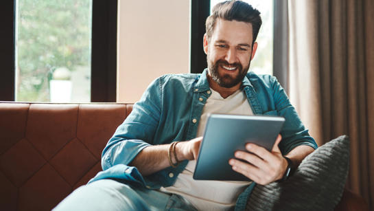 Man Looking At Ipad