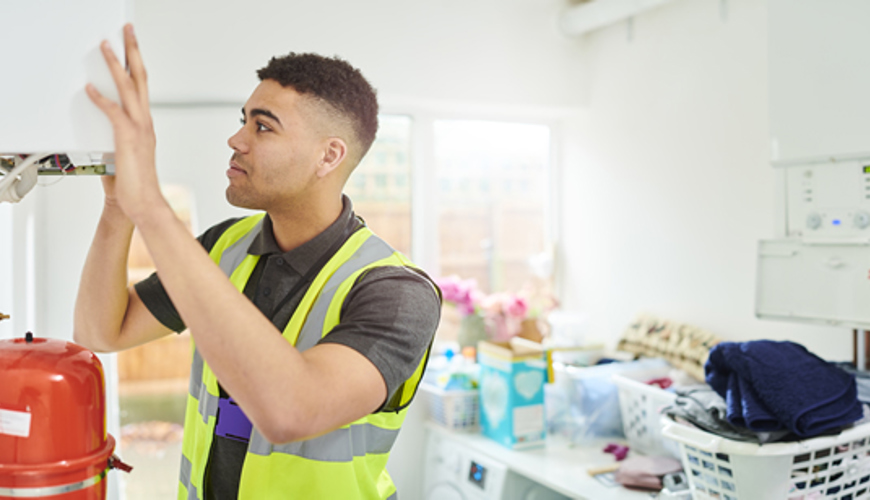 Man Repairing Boiler