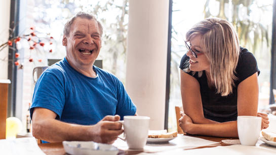 Photo of man with his carer