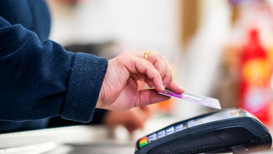 Person Making Contactless Payment