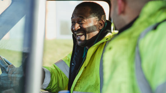 Workmen In Vehicle