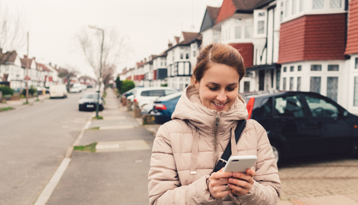 Woman On Phone In Street