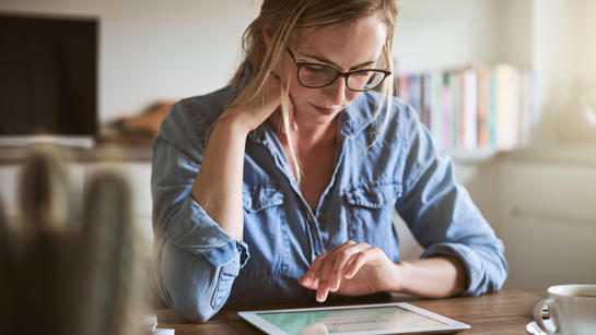 Woman Using Tablet Computer