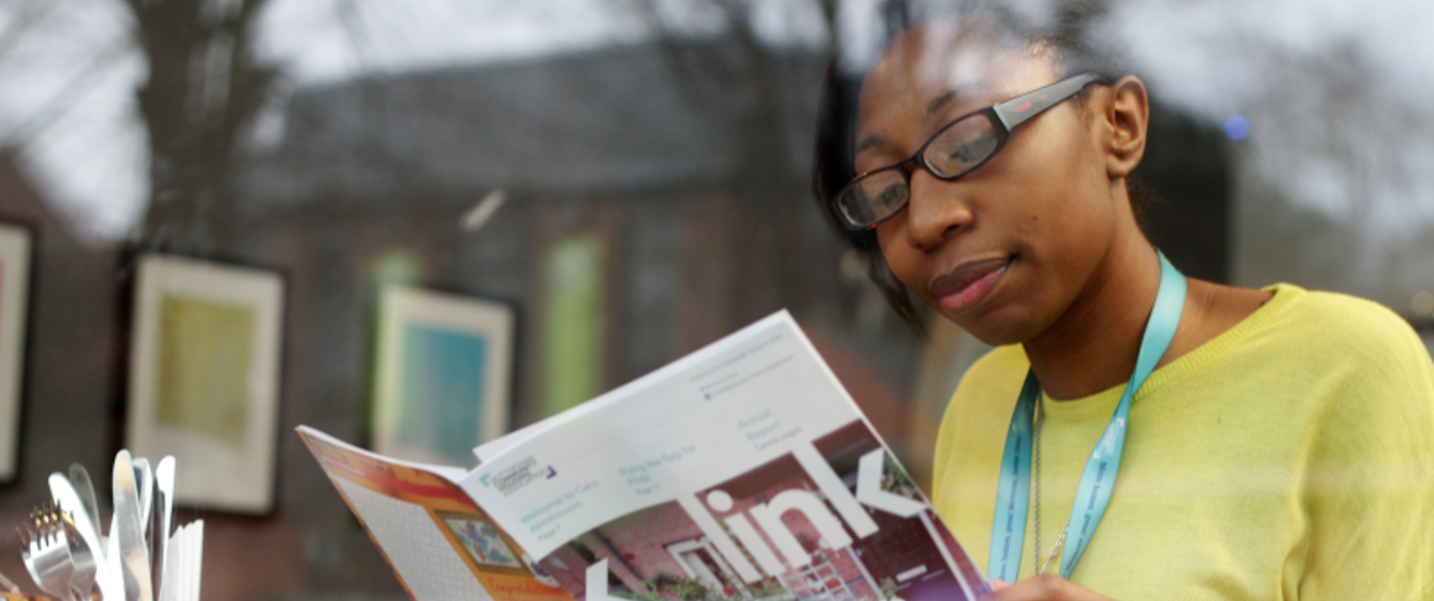 Person Reading A Magazine