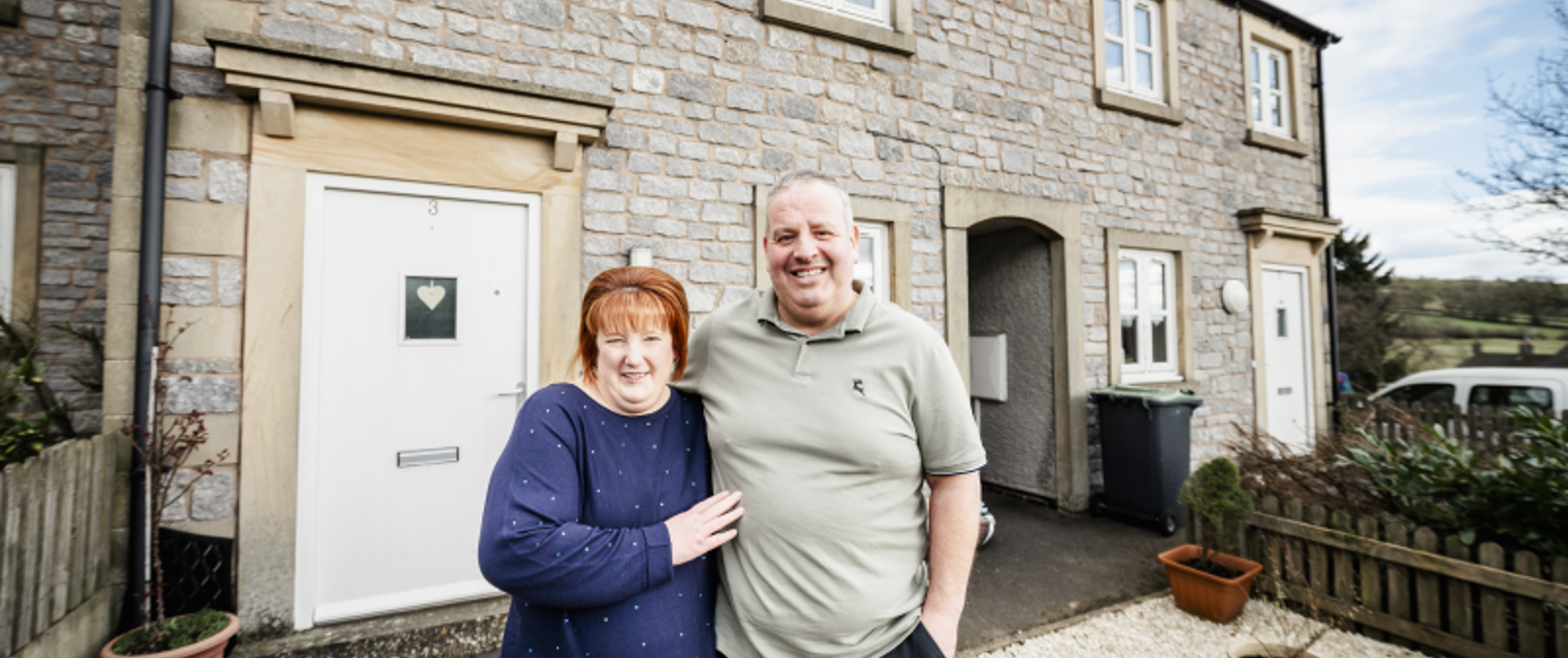 Family Outside Their House