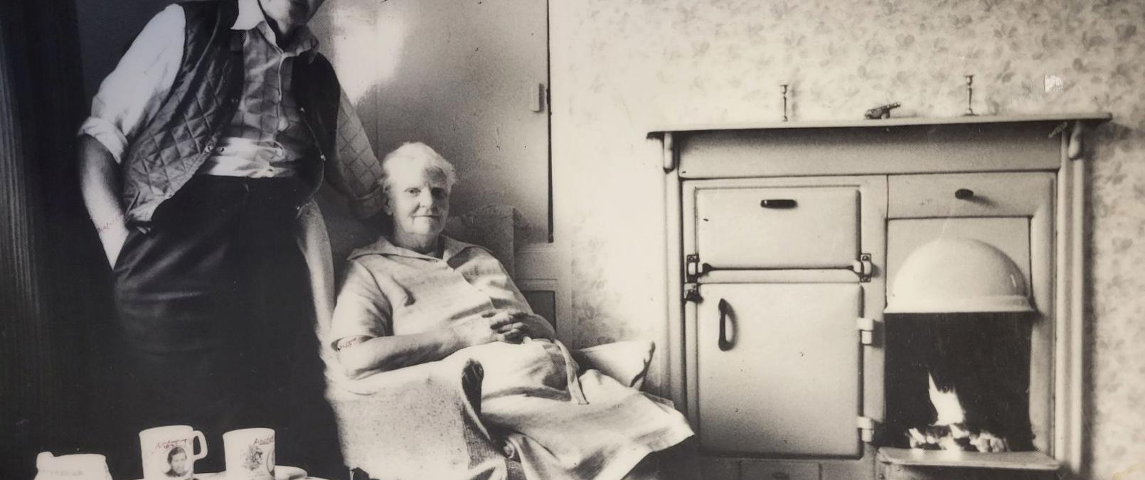 Couple In Coal Board House Kitchen