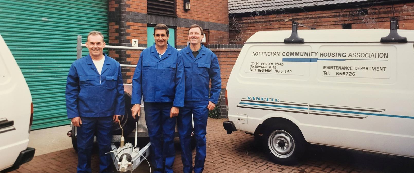 Men Standing Next To Vans