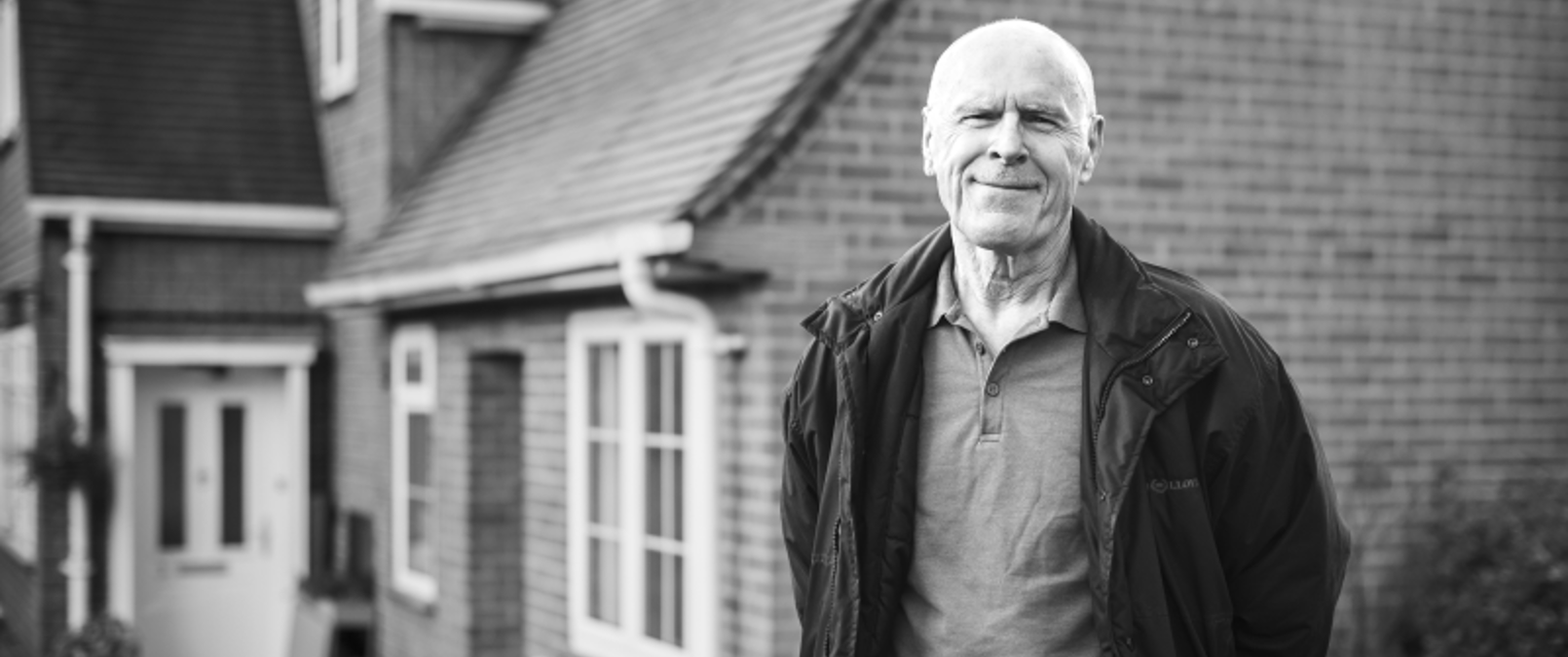 Ron Dakin Outside Almshouses