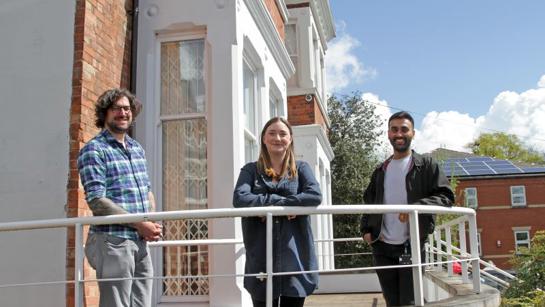 Colleagues Standing Outside Pelham House