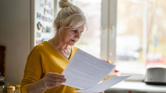 Woman With Paperwork